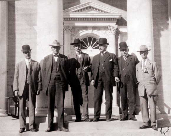 Political group at Governor’s Mansion, Santa Fe, New Mexico, ca. 1910-1911. Pictured left to right; Harry W. Kelly, Holm Bursum, Albert B. Fall, Governor William Mills, Dr. J.M. Cunningham, and unidentified. Photograph by Walton. Courtesy Palace of the Governors Photo Archives (NMHM/DCA), neg. no. 102043.