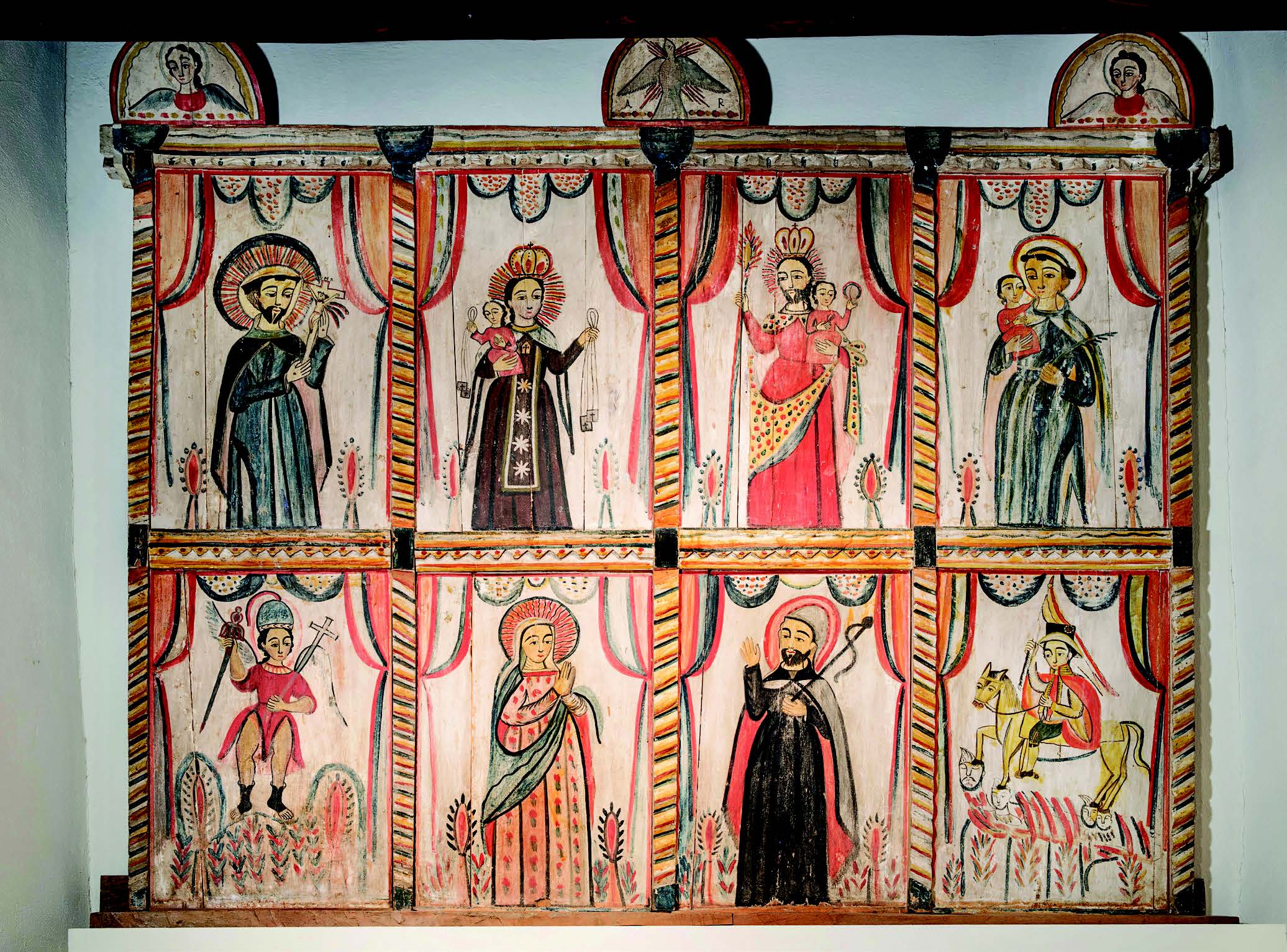 Altar screen from Llano Quemado by Rafael Aragón. Spanish Colonial Arts Society loan to the New Mexico History Museum.