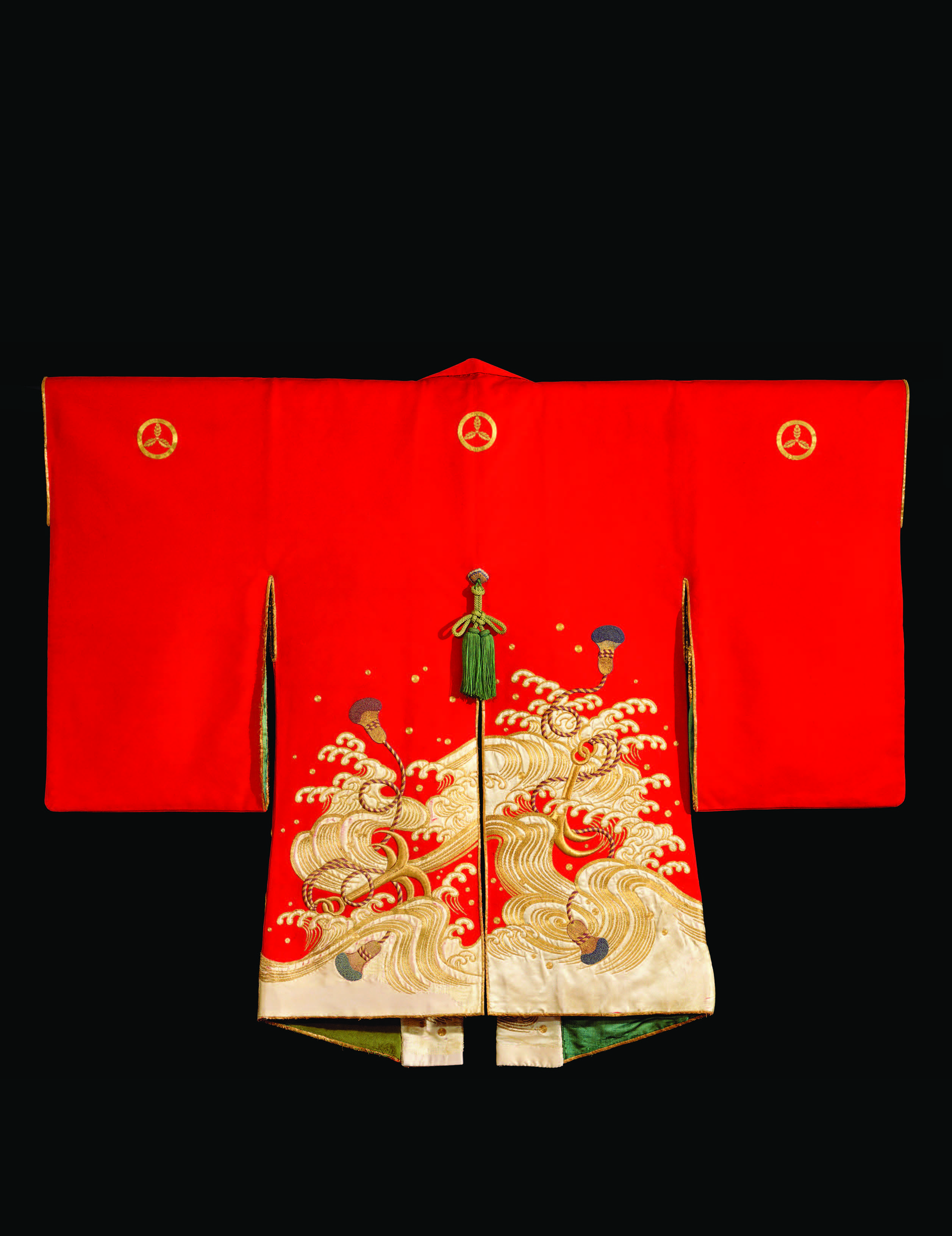 Firefighter’s ceremonial coat (kajibanten), Japan, eighteenth– nineteenth century, Edo period. This cochineal-dyed cape was likely only used for ceremonial purposes. A sturdier coat, often made of leather, would be worn during firefighting. Wood with gold- and silk-thread embroidery and appliqué, 38 × 48 in. John C. Weber Collection. Photograph by John Bigelow Taylor.