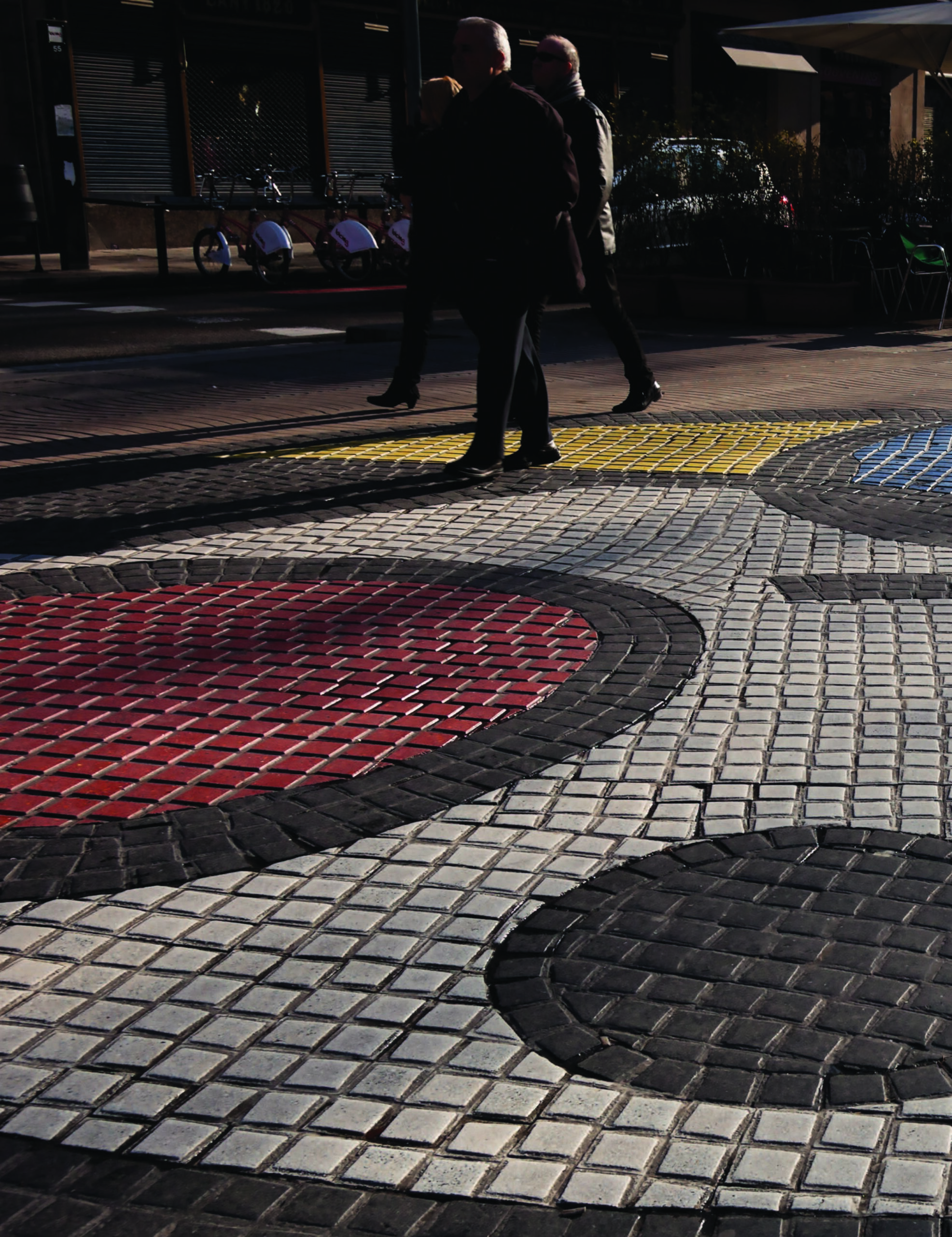 Photograph: Pavement mosaic by Joan Miró (1971), La Rambla, Barcelona.