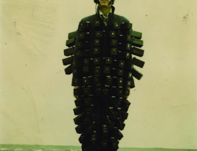 Ben Conrad, Front view of Ben Conrad wearing pinhole suit and helmet with 130 cameras, 1994. Palace of the Governors Photo Archives, Pinhole Resource Collection HP.2012.15.1398.