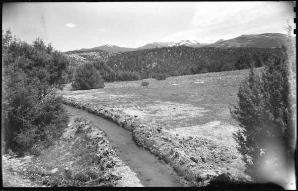 Acequia (irrigation ditch) possibly near Cordova or Truchas, New Mexico, ca. 1925–1945. Photograph by T. Harmon Parkhurst. Courtesy the T. Harmon Parkhurst Collection, the Palace of the Governors Photo Archives (NMHM/ DCA), neg. no. 069231.