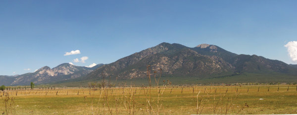 Southern Rocky Mountains: Taos Range of the Sangre de Cristo Mountains viewed just outside Taos, New Mexico. Old rocks were folded into mountains at the end of the age of dinosaurs and then shaped by glaciers. Photograph by Larry Crumpler, New Mexico Museum of Natural History and Science.