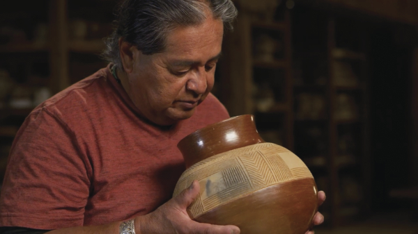 Clarence Cruz (Ohkay Owingeh), uncle of Patrick Cruz, discusses his choice of pottery in the video portion of the Grounded in Clay exhibition, directed by Adam Shaening-Pokrasso.