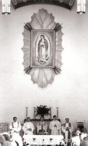 Mass at Our Lady of Guadalupe Church, Santa Fe, New Mexico, 1982. Photograph by Michael Heller. Courtesy The Santa Fe New Mexican Collection, Palace of the Governors Photo Archives (NMHM/DCA), neg. no. HP.2014.14.1412.