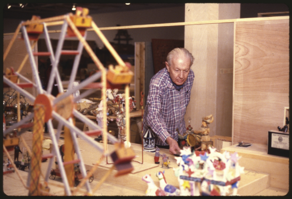 Alexander Girard installing an exhibition at the Folk Art Museum, Santa Fe, New Mexico, not dated. Photograph by Mark Nohl. Courtesy Palace of the Governors Photo Archives (NMHM/DCA), neg. no. HP.2007.20.1155.