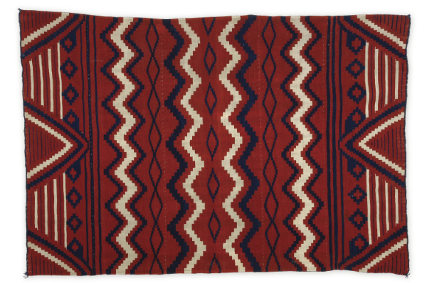 Artist once known (Diné), shoulder blanket, 1850–1860. Handspun wool, cochineal dye, indigo dye, bayeta, lac dye. 80 × 55 inches. Museum purchase. MIAC Collection: 9091/12.