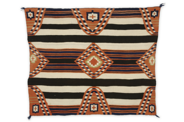 Artist once known (Diné), chief blanket, 1875–1880.
Handspun wool, indigo dye, vegetal dye. 594⁄5 × 701⁄5 inches. Gift of Mrs.
Philip B. Stewart. MIAC Collection: 9096/12.