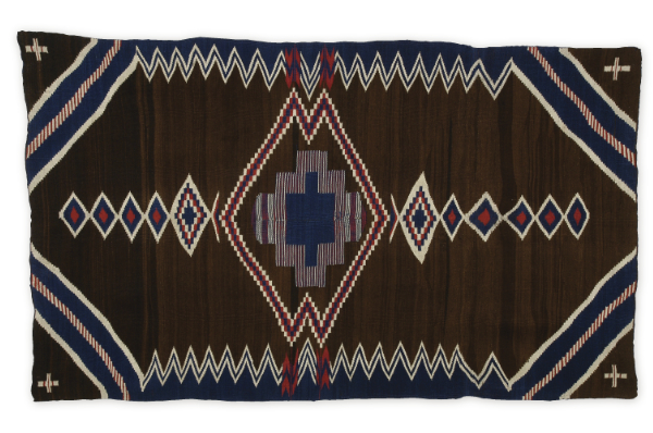 Artist once known (Diné), poncho/serape, 1870–1880. Handspun wool, bayeta, indigo dye. 84½ × 51 inches. Harry Kelly Collection. MIAC Collection: 9159/12.1.