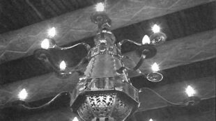 Laboratory of Anthropology foyer chandelier. Terneplate, reverse-painted glass. Approx. 60 × 55 inches. Photograph by Nancy Hunter Warren, as printed in El Palacio, vol. 87, no. 3.