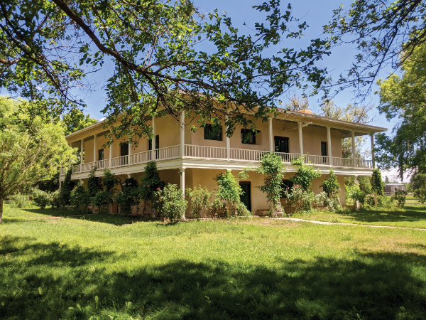 The 5,700-square-foot hacienda is only one of two ranch
houses with two-story wrap-around porches dating to the Territorial Period in New Mexico.