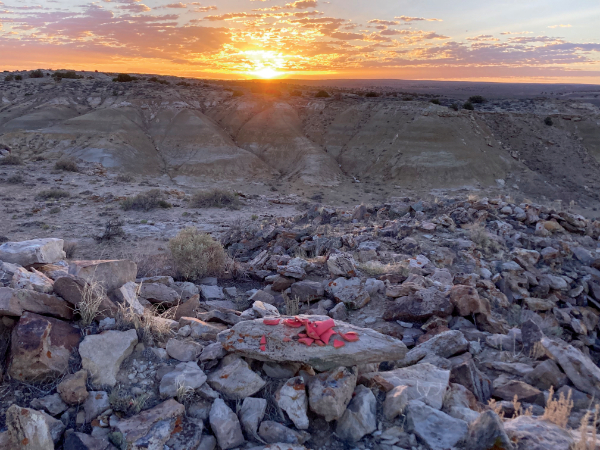 Sunrise on the Acropolis. Broken pieces of Kira Enriquez’s ceramic vessel remain after the author’s funerary ceremony in honor of Scott Tsoodle.